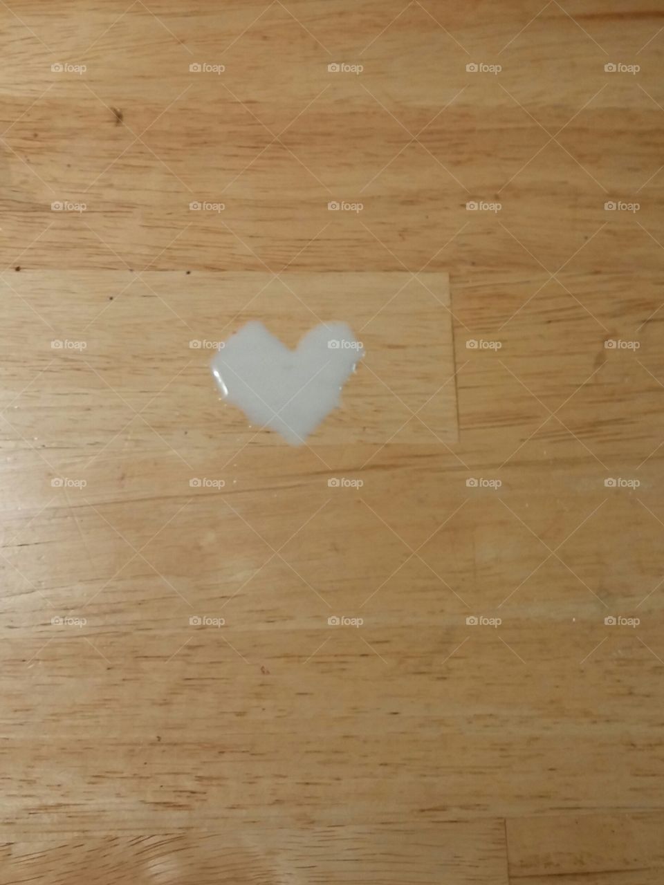 Spilled Milk. My daughter spilled her milk on the shape of a heart. 