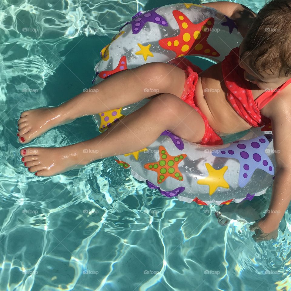 Floating in the pool