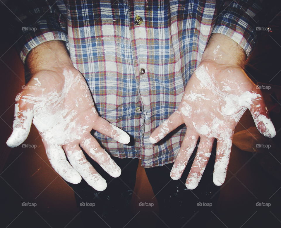 Paint-covered hands after paint job
