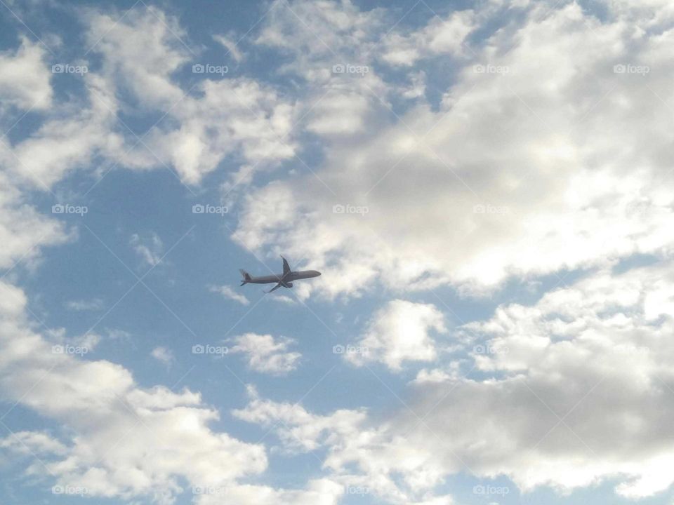 Beautiful airplane flying across the sky.