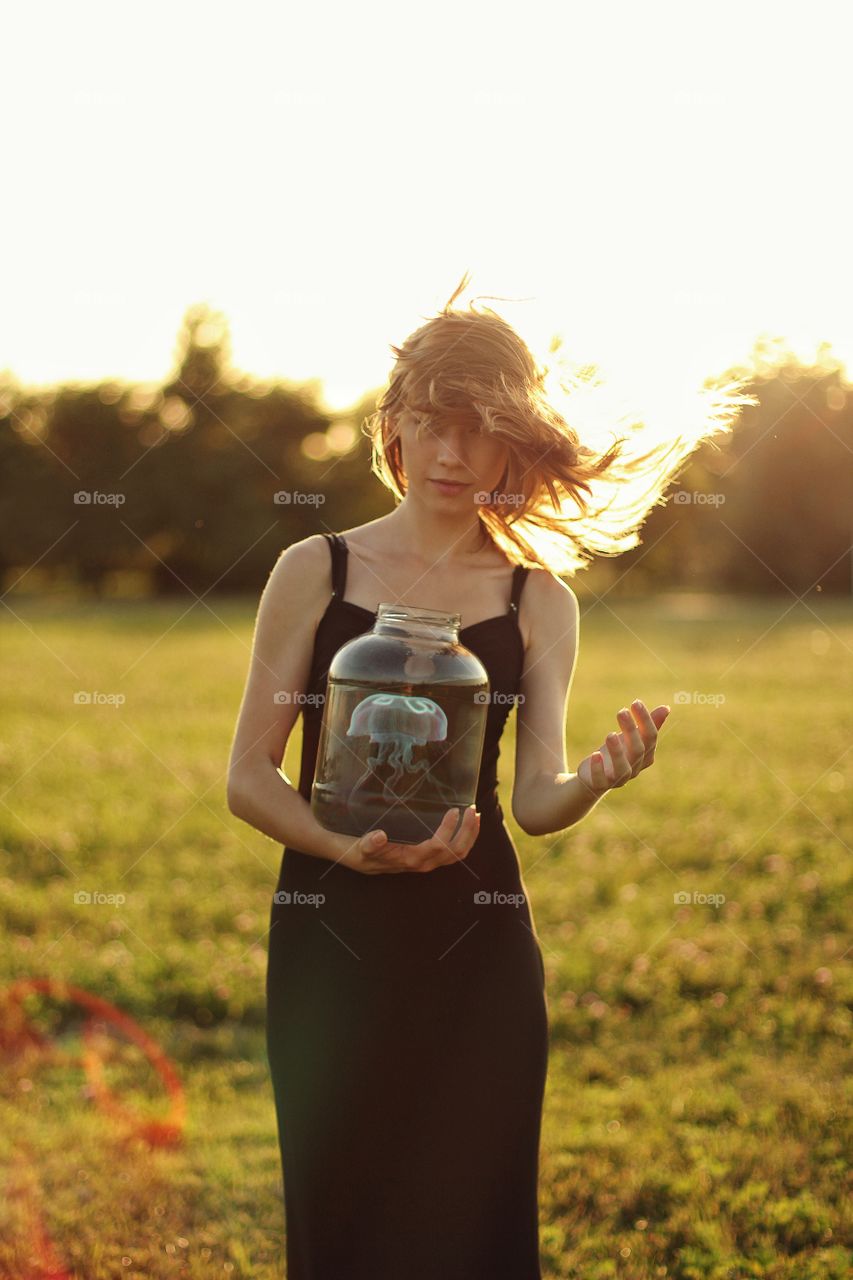 Girl with a jellyfish in a jar