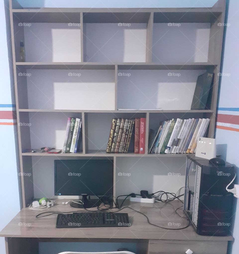 Self-development, further research, learning, and creativity.
A unique study corner featuring a screen displaying educational content alongside a handwritten notebook, blending modern and traditional tools.