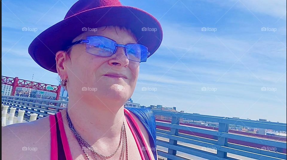 This is me, „Petra Schiller“ a.k.a. „Maxine Firefox“ descending on the downward slope of the „Pulaski Bridge“ to take the staircase down to „Greenpoint“, Brooklyn to go grocery shopping. 2023. Hypnotic Productions