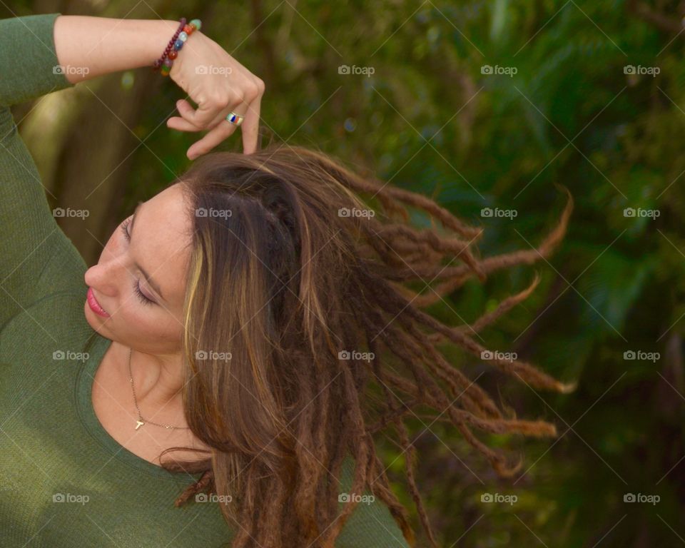 Dancing Dreads. Pretty Young lady with dreadlocks