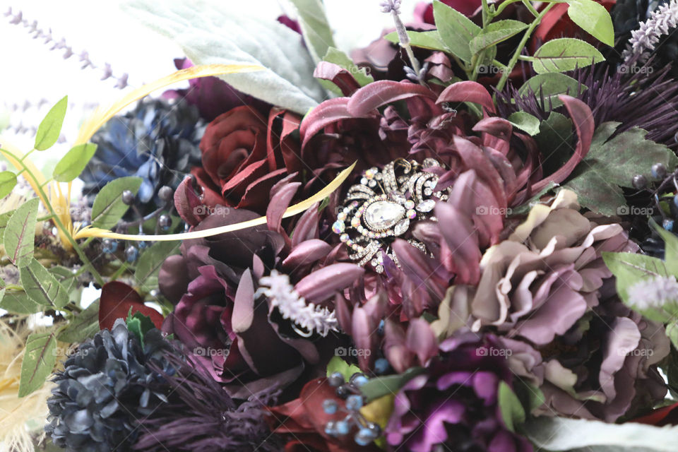 Bridal bouquet close up purple with embellishment 