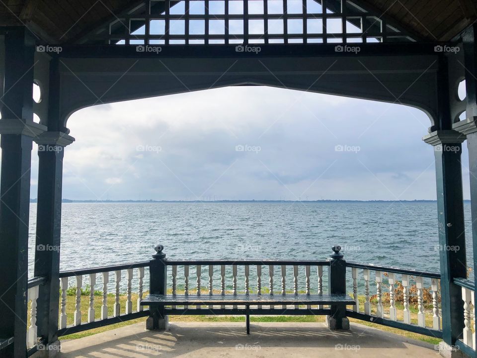 Lake bench empty due to people working from home 