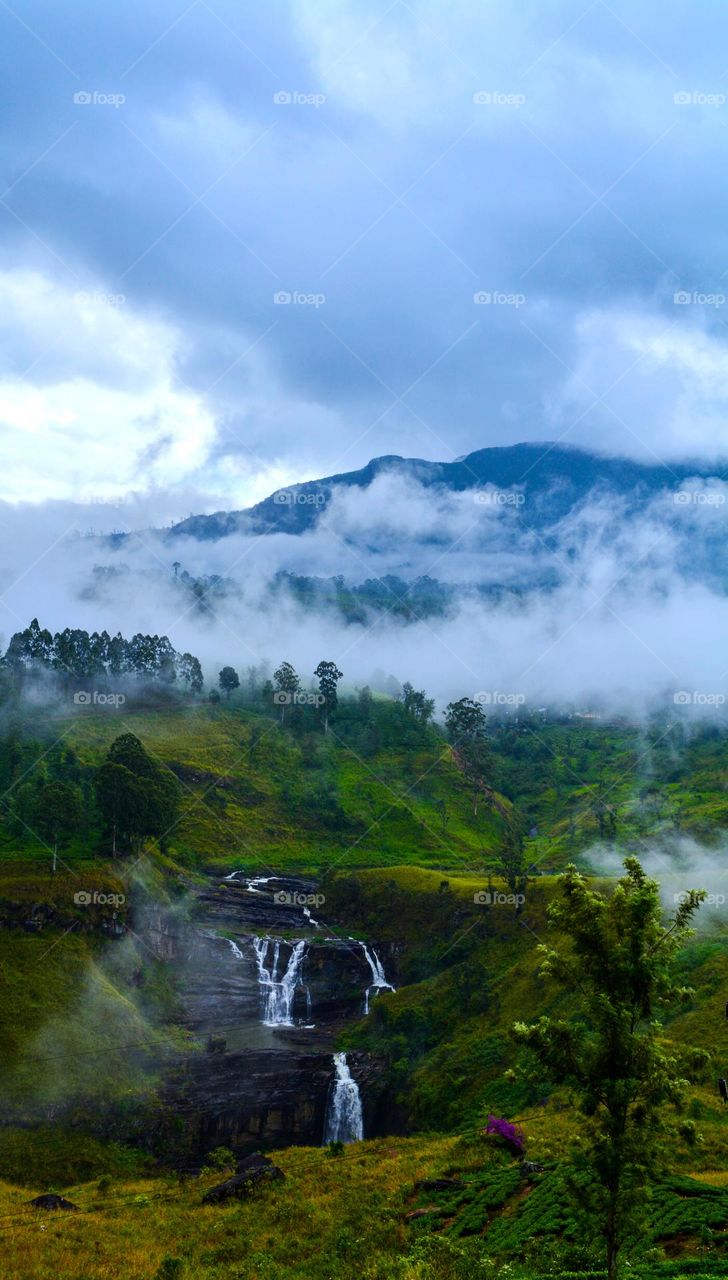Mystic Cascades: St. Clair Waterfall's Dance in the Misty Mountains