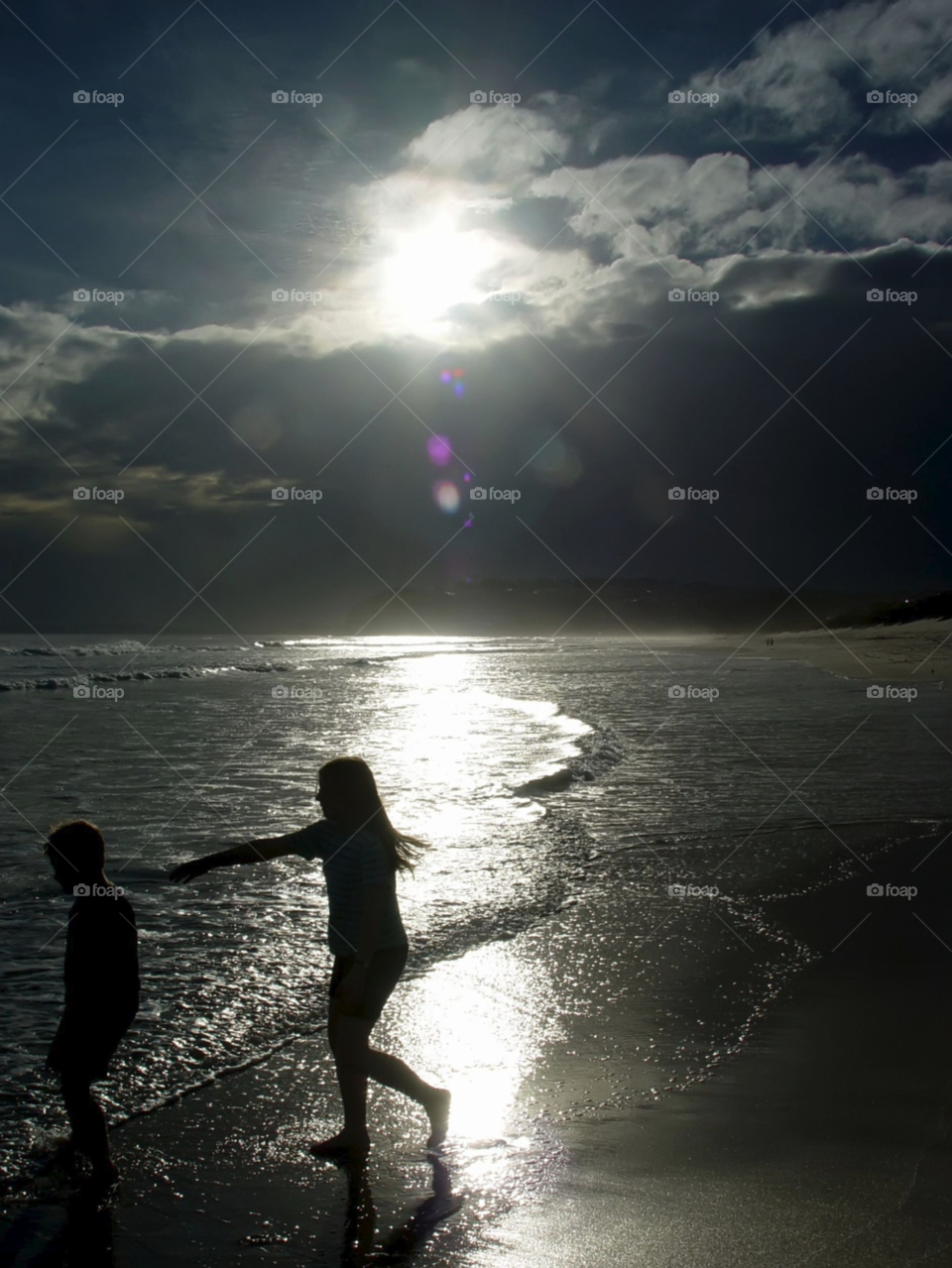 beach children sunset silhouette by wme