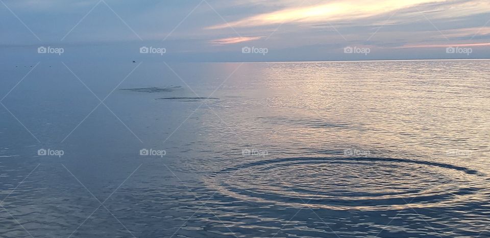 watching the sunset and skipping rocky