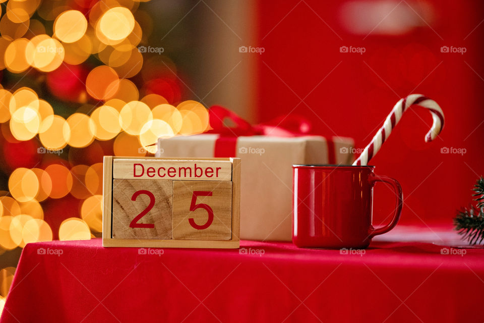 Christmas background with wooden block calendar with the date of December 25