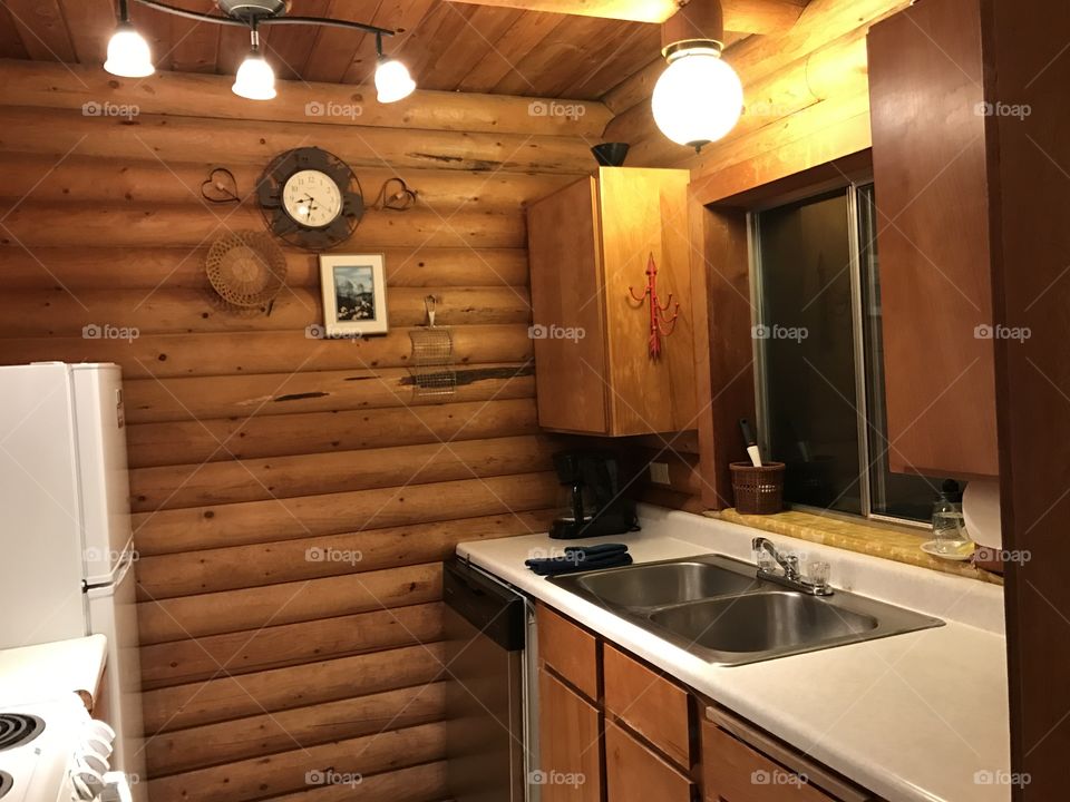 Cozy cabin in the woods, nice vacation home. Wooden  walls and furniture 