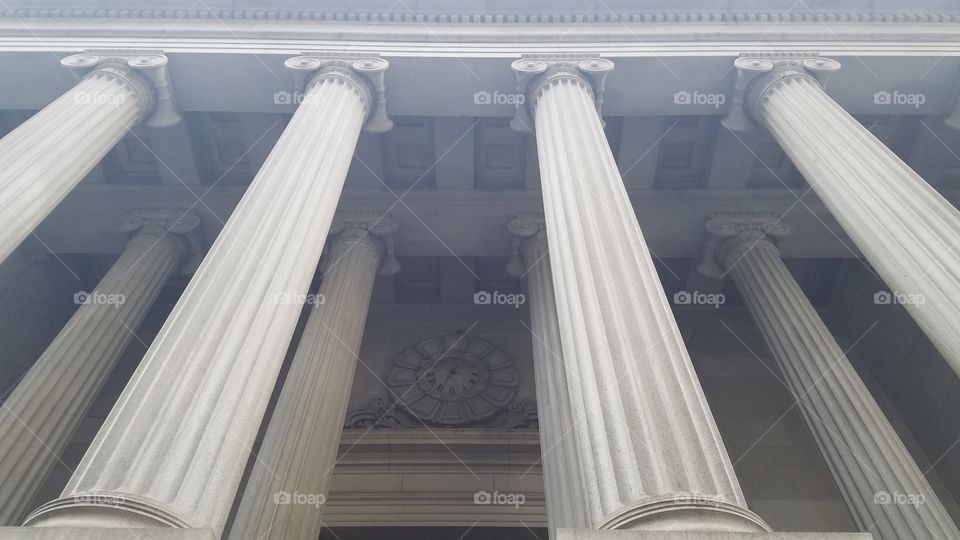 Columns on building off Wall Street, New York.