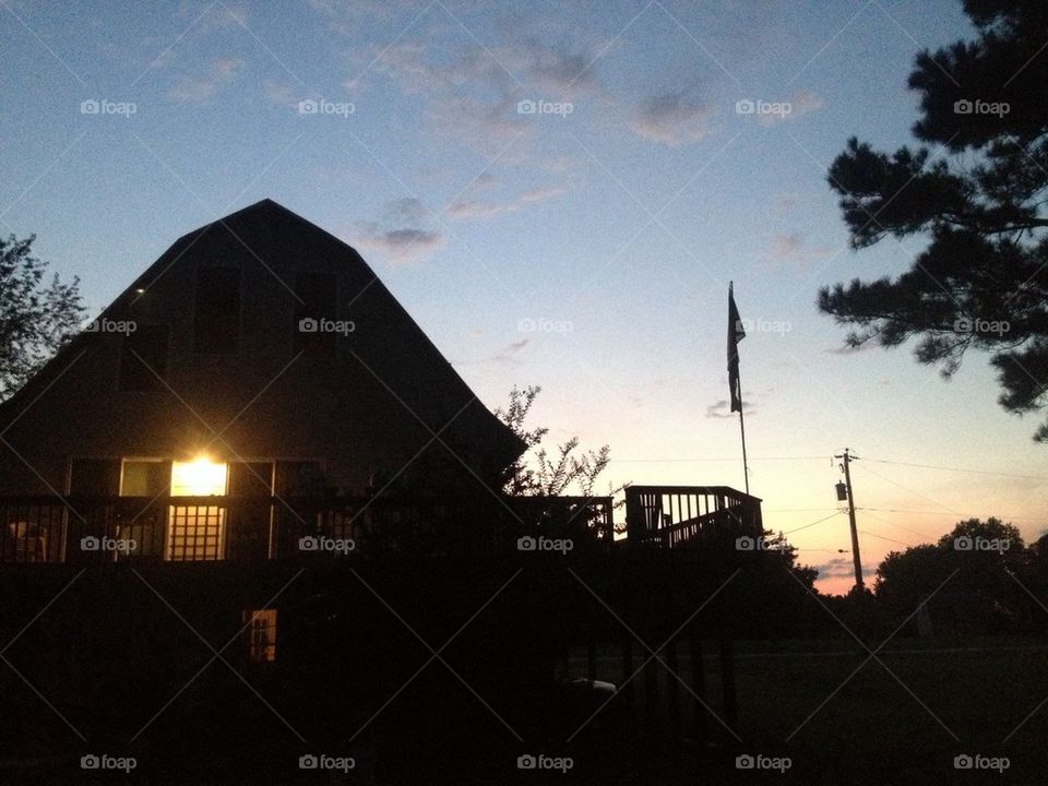 Sunset over a barn