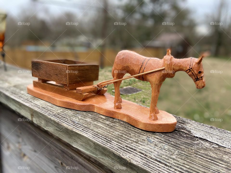 Wooden carving, horse drawn tobacco wagon 