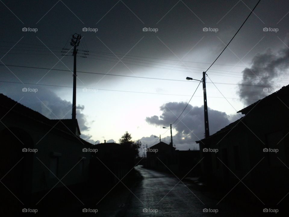 Dark morning sky in a small village