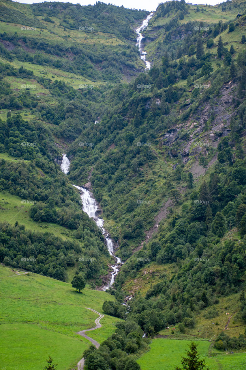 A Waterfall in the Mountains