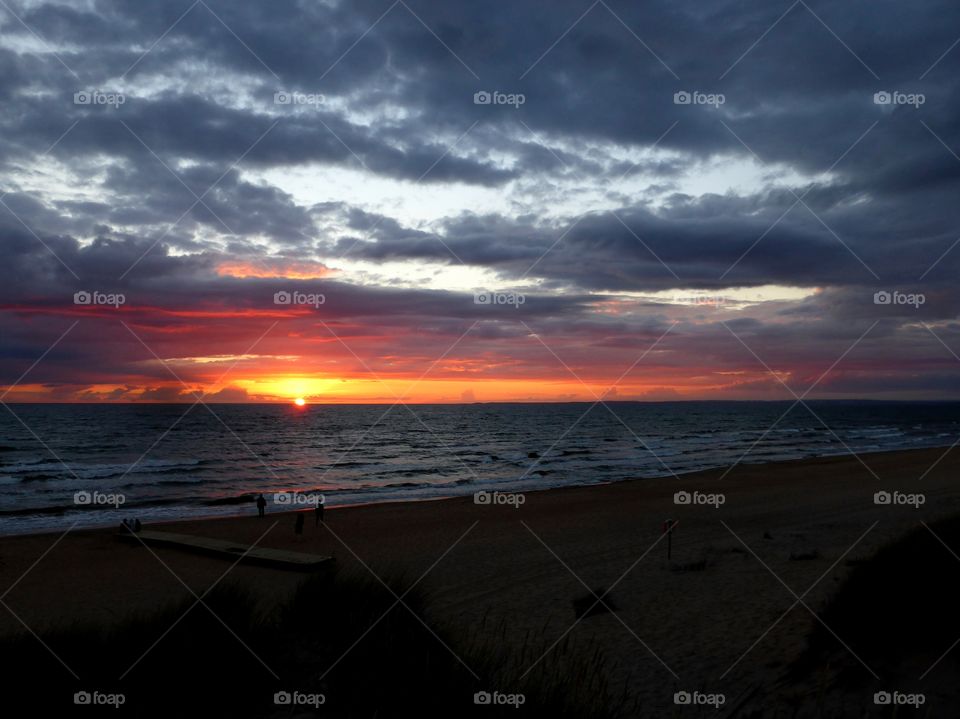 storm  clouds over stormy sea in the dawn