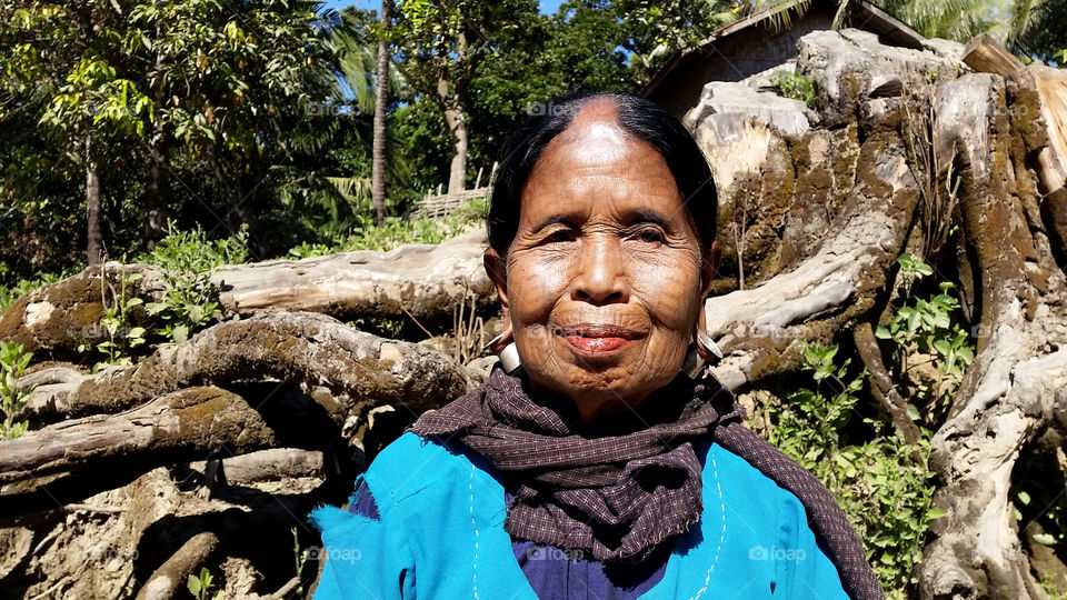 Old woman with the tatoo in Myanmar