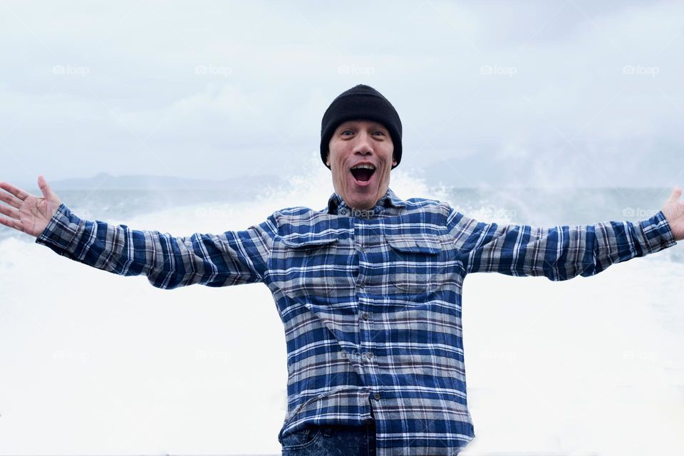 Excited man in a boat