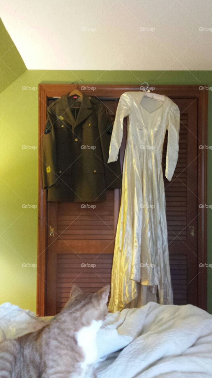 Fancy white dress and military uniform