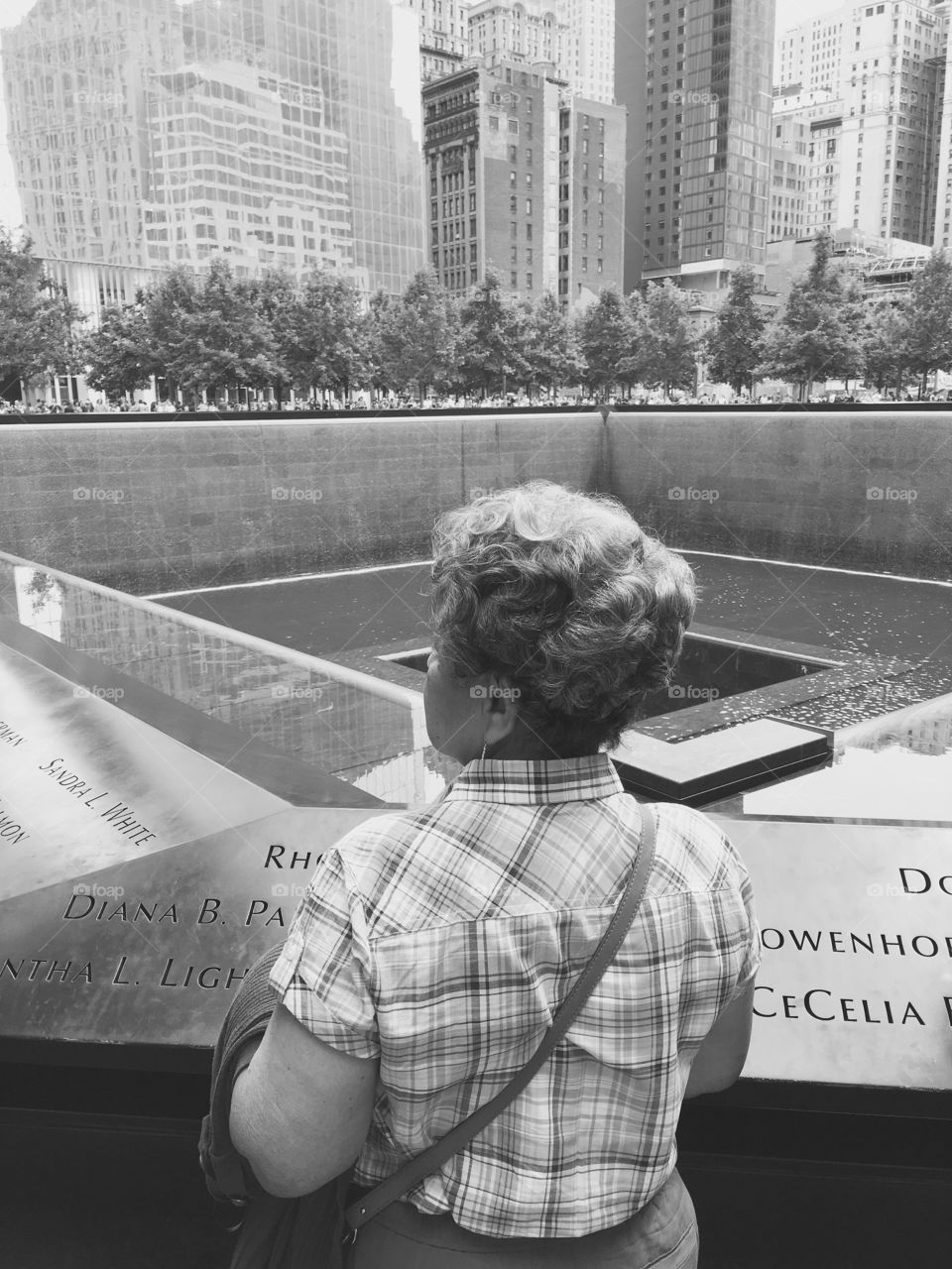 Remembering is reliving. 9/11 memorial NYC