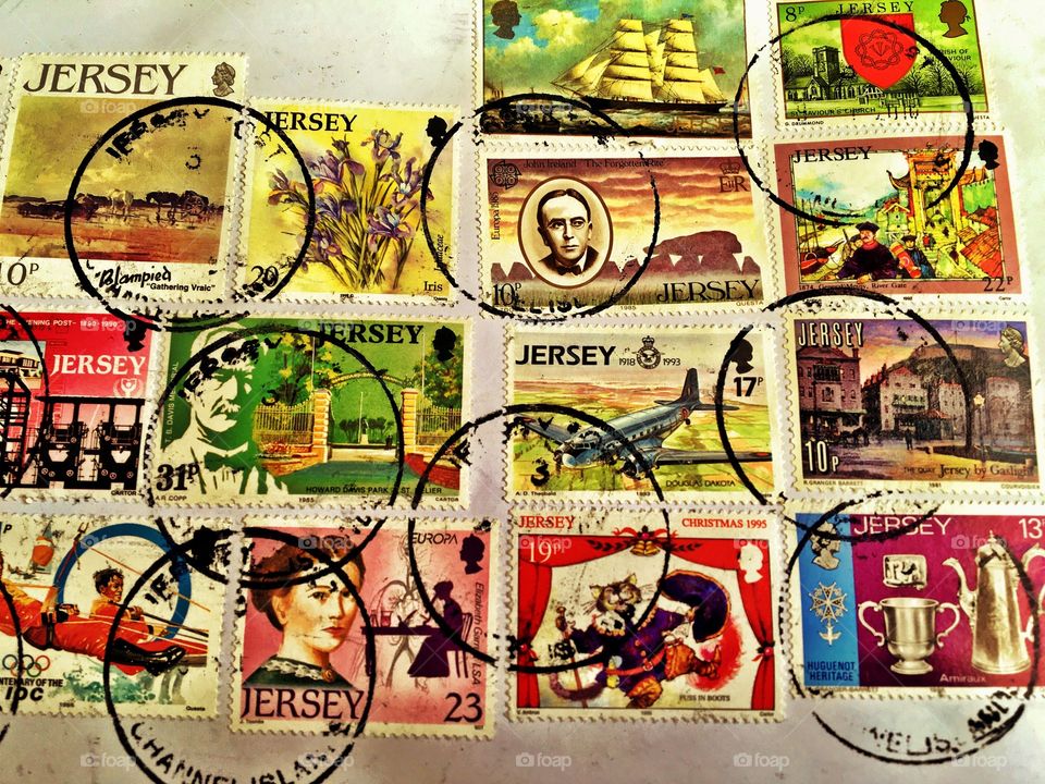 Lots of postal stamps on a parcel 