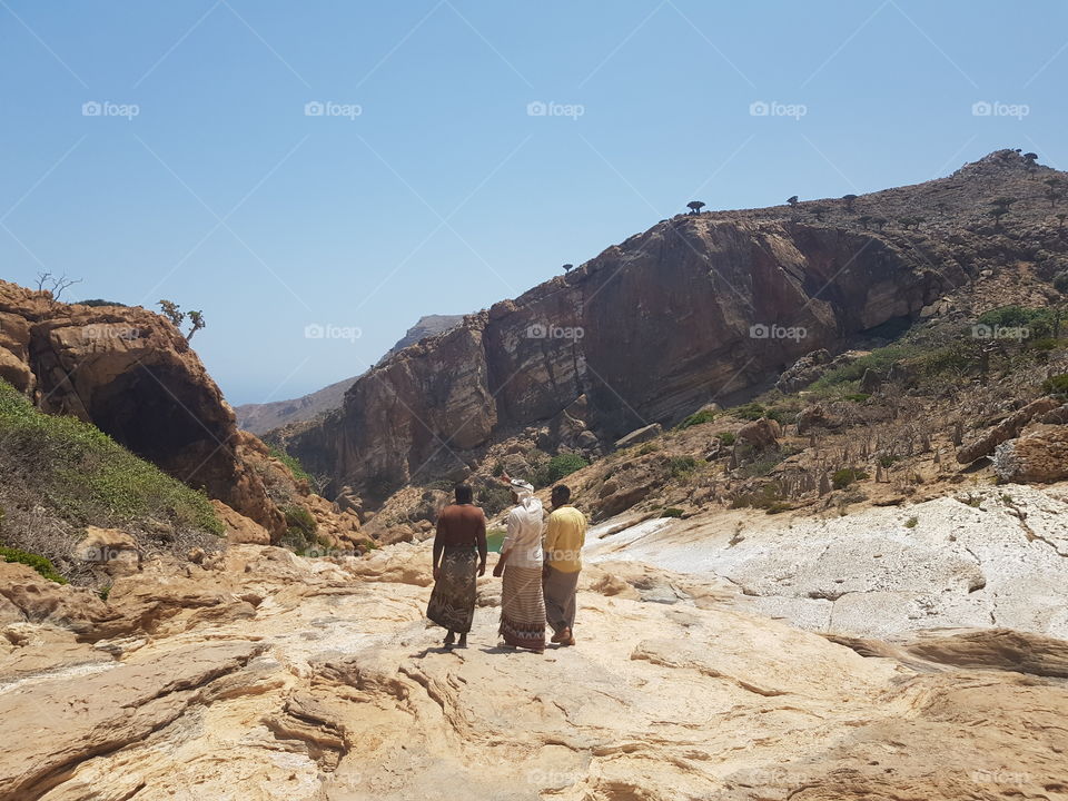 Socotrian men in a canyon
