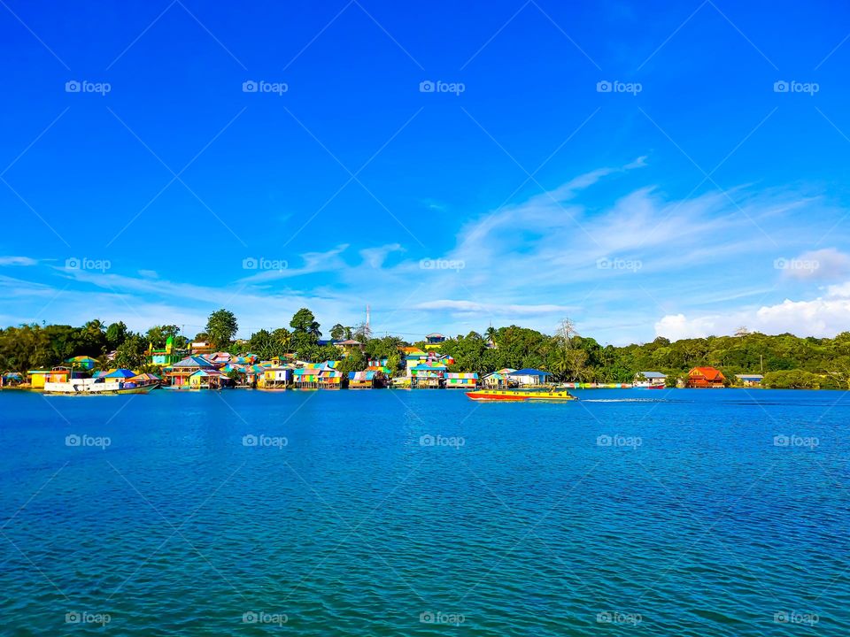 Beautiful view of the Rainbow Village in Tual City with itu blue bay