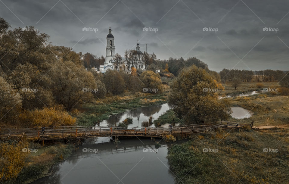 Orthodox Church on a river, autumn aerial landscape, Russia, Vladimir region 