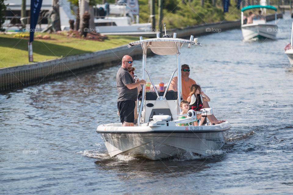 Family boat sailing in the water