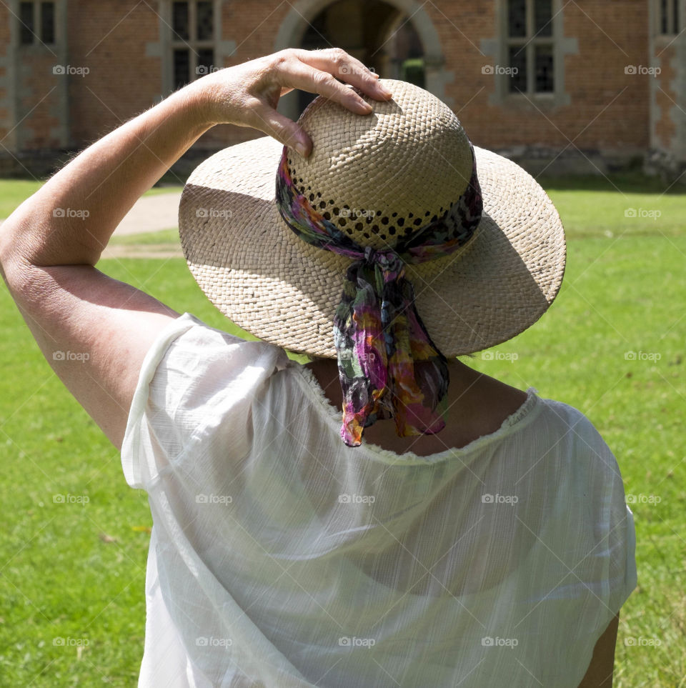 Woman. Straw hat