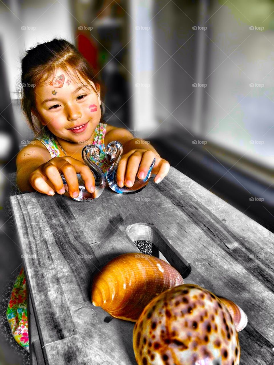 Girl and glass swans