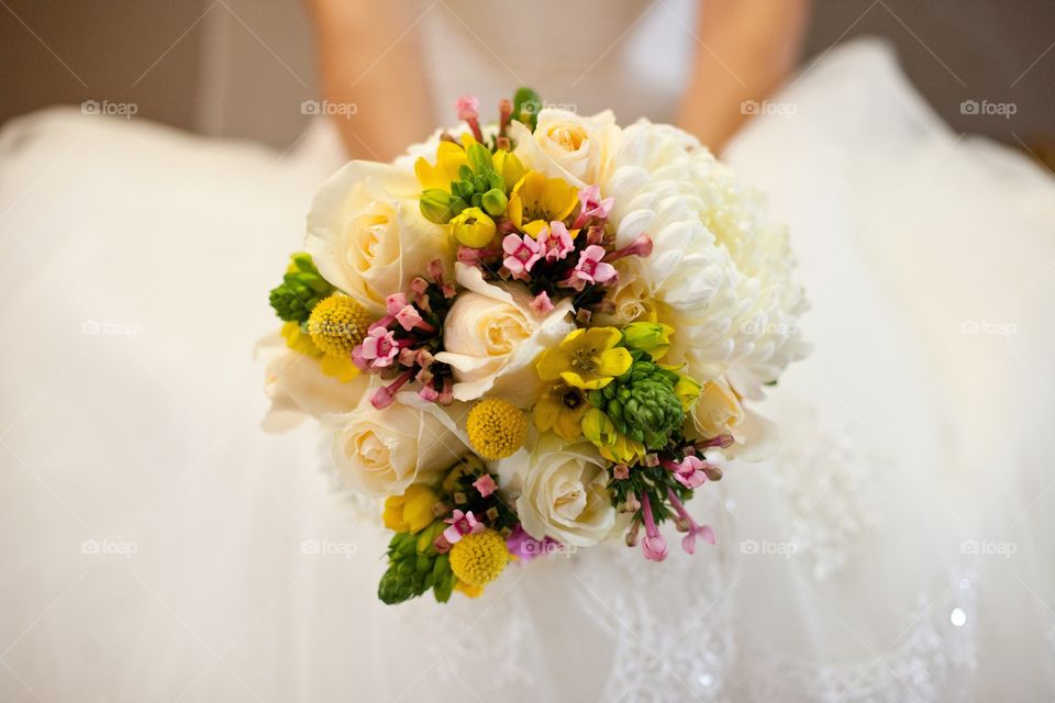 Bride holding her bouquet on her wedding day