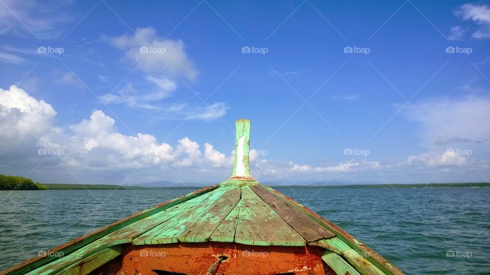 Wooden boat and blue sky