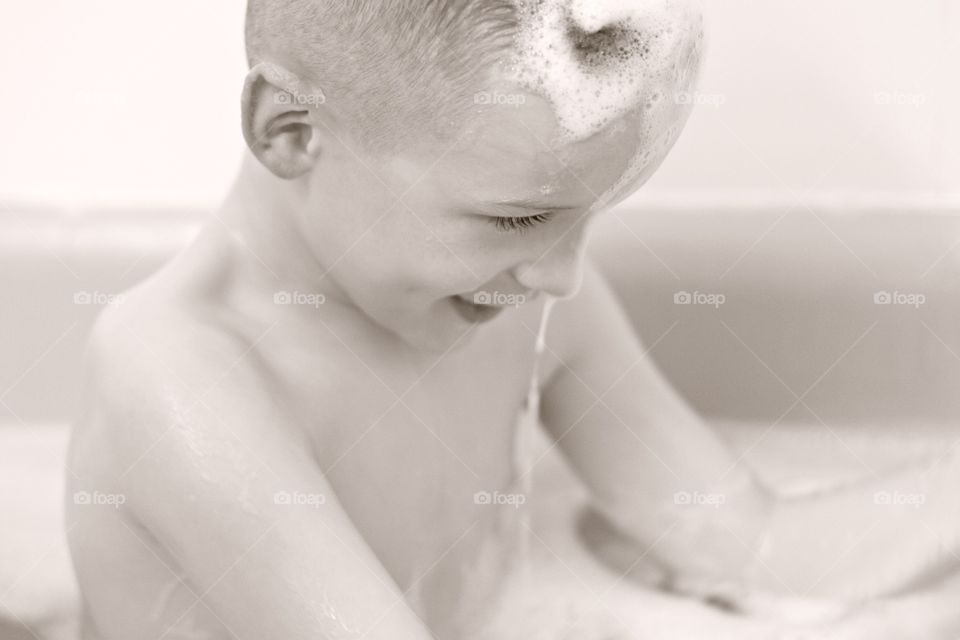 Portrait of a boy bathing