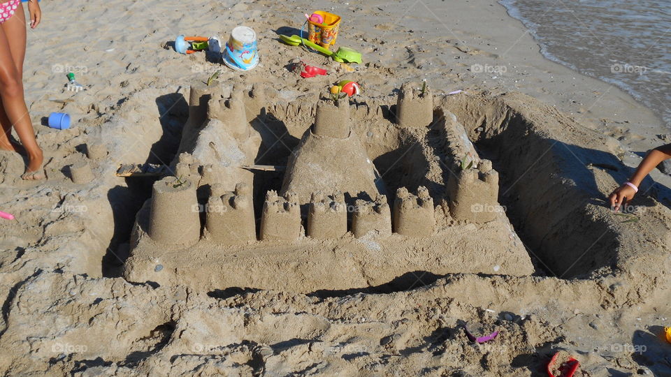 Sand castle on beach. Sand castle on beach
