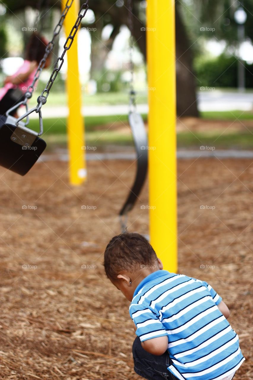 BOY AND A SWING