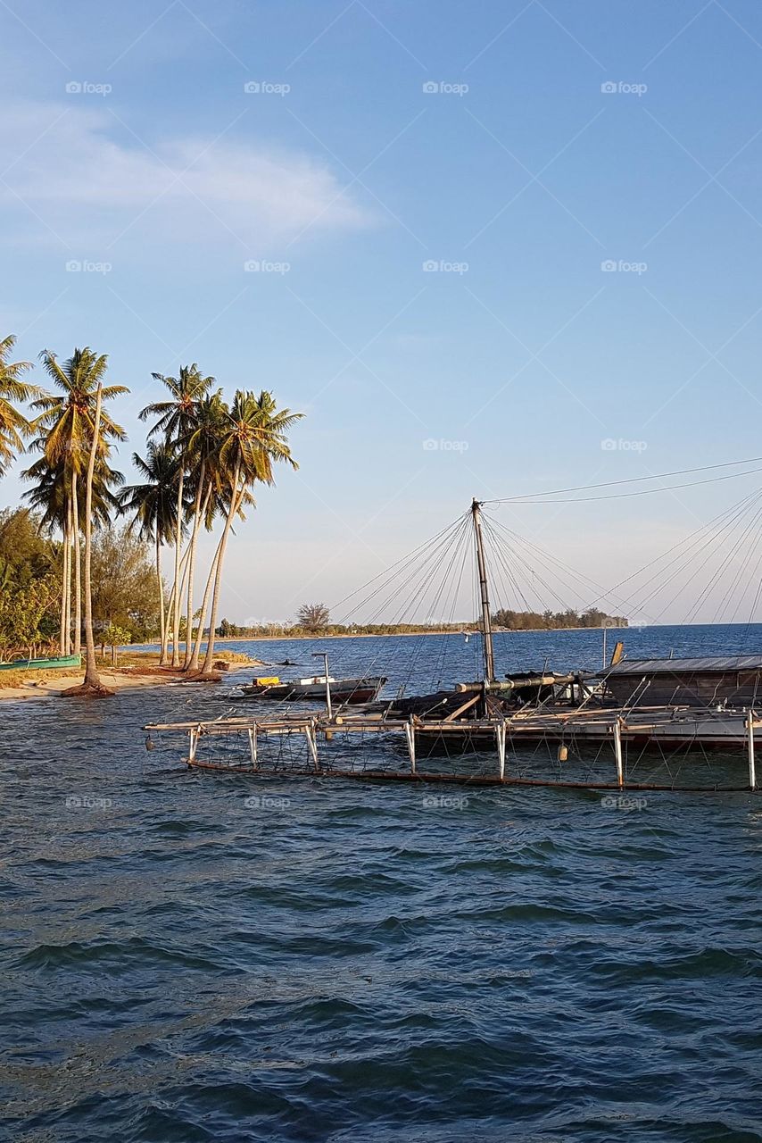 Beach and fishing boats.