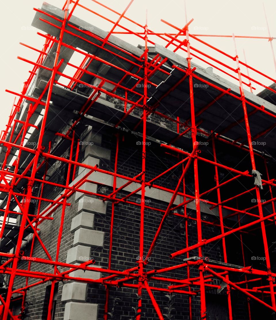 Red Scaffolding . Colour splashed the scaffolding to make it more interesting and vibrant 