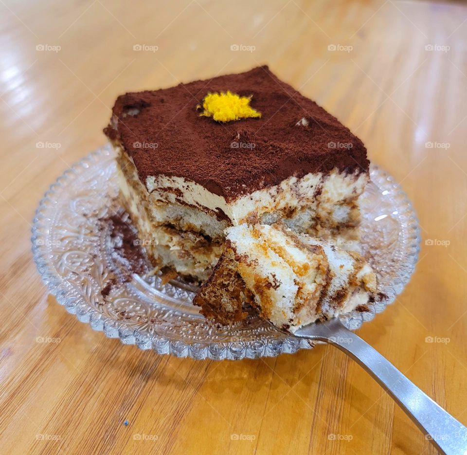 tiramisu on glass plate.Tiramisu in a glass dish