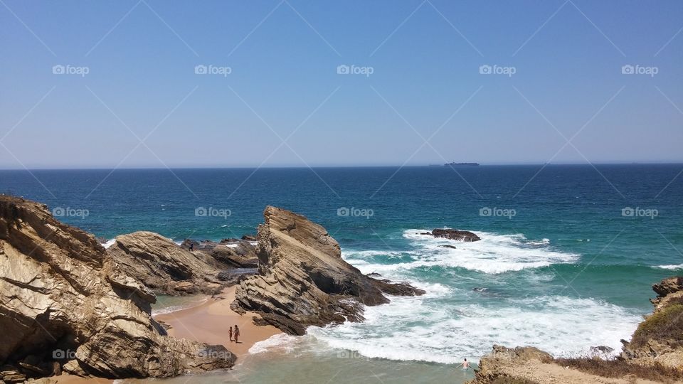 Tourist enjoying on sandy beach