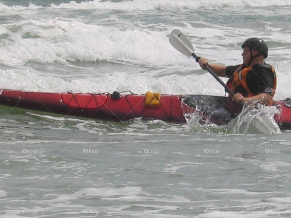 Kayak surfing