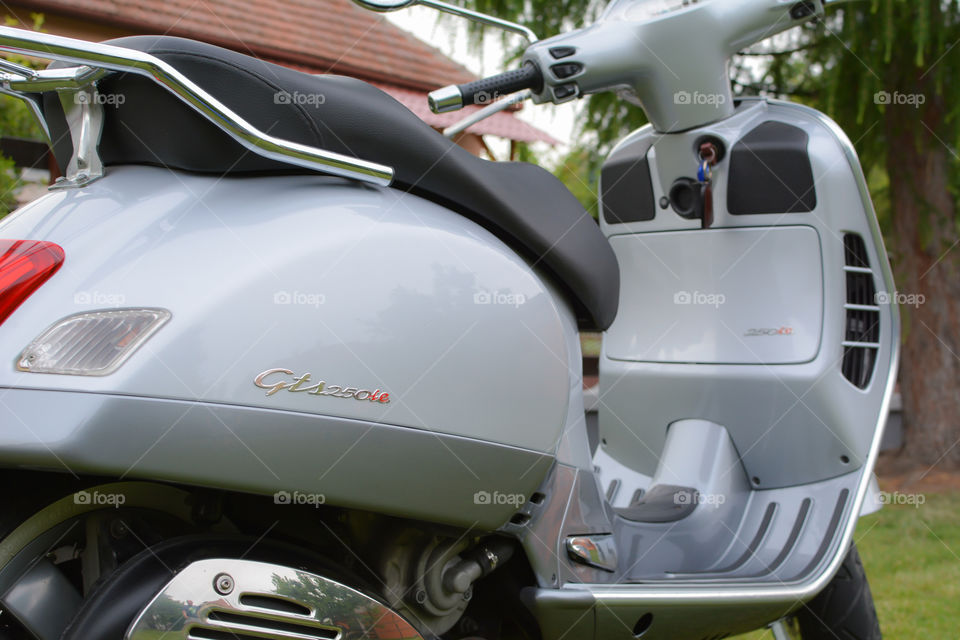 grey vespa motorcycle, italian style