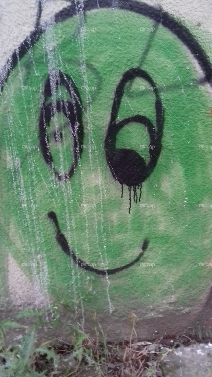 green children painting on wall graffiti