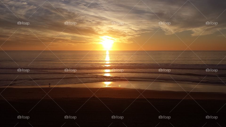 Gorgeous reflective sunset on the ocean in Santa Cruz, California