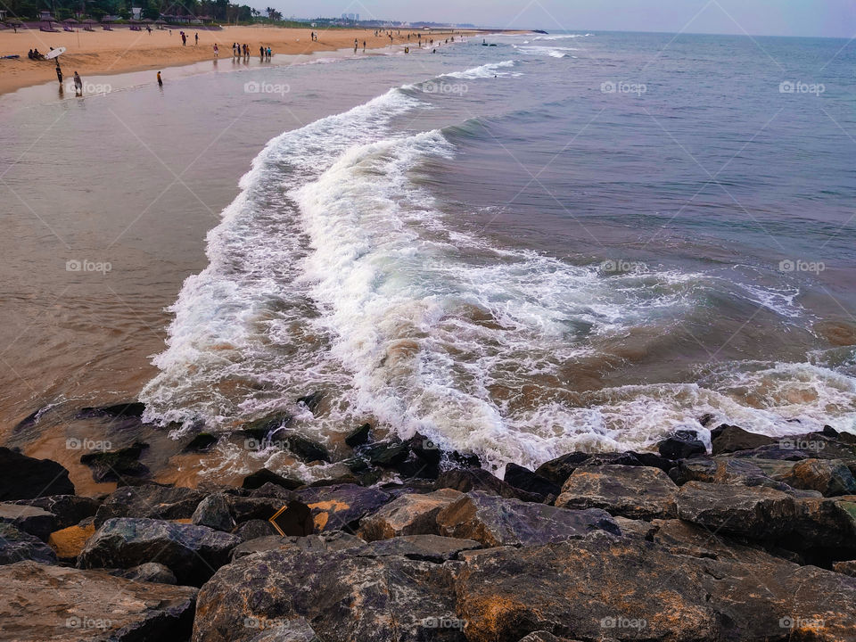 Soft wave of blue ocean on sandy beach. Background.wallpaper.Indian ocean