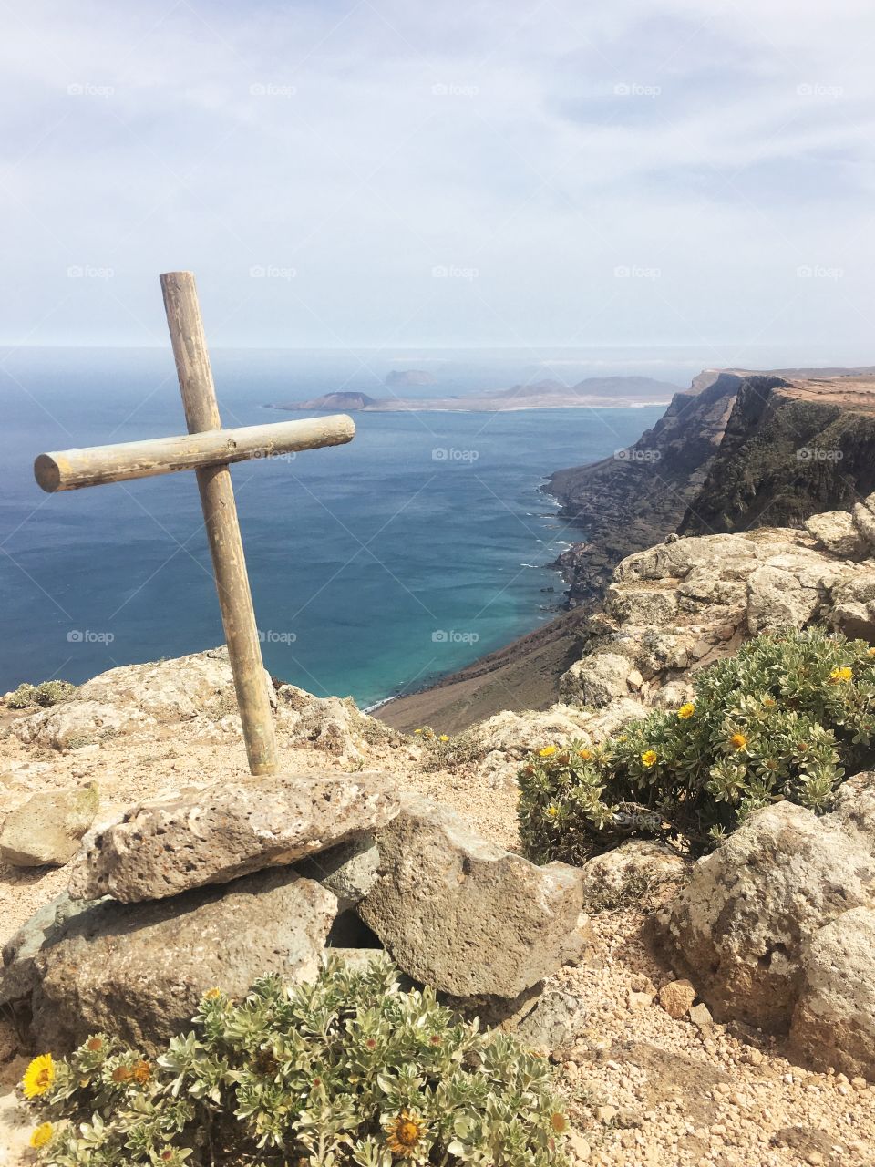 Cross on a cliff side