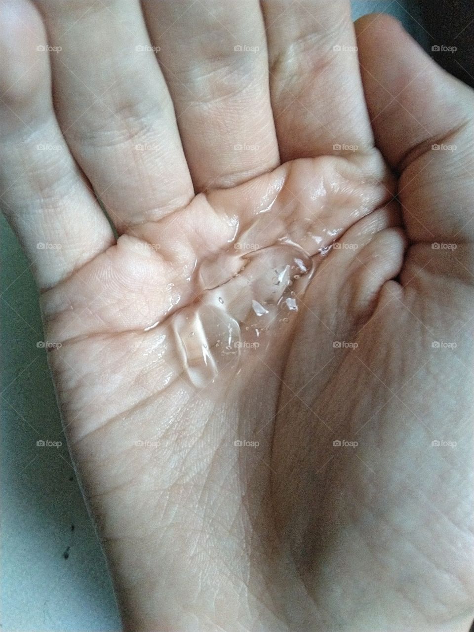 hand sanitizer on a hand