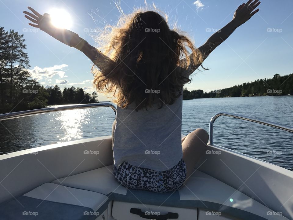 Summer vacation - boating on a lake