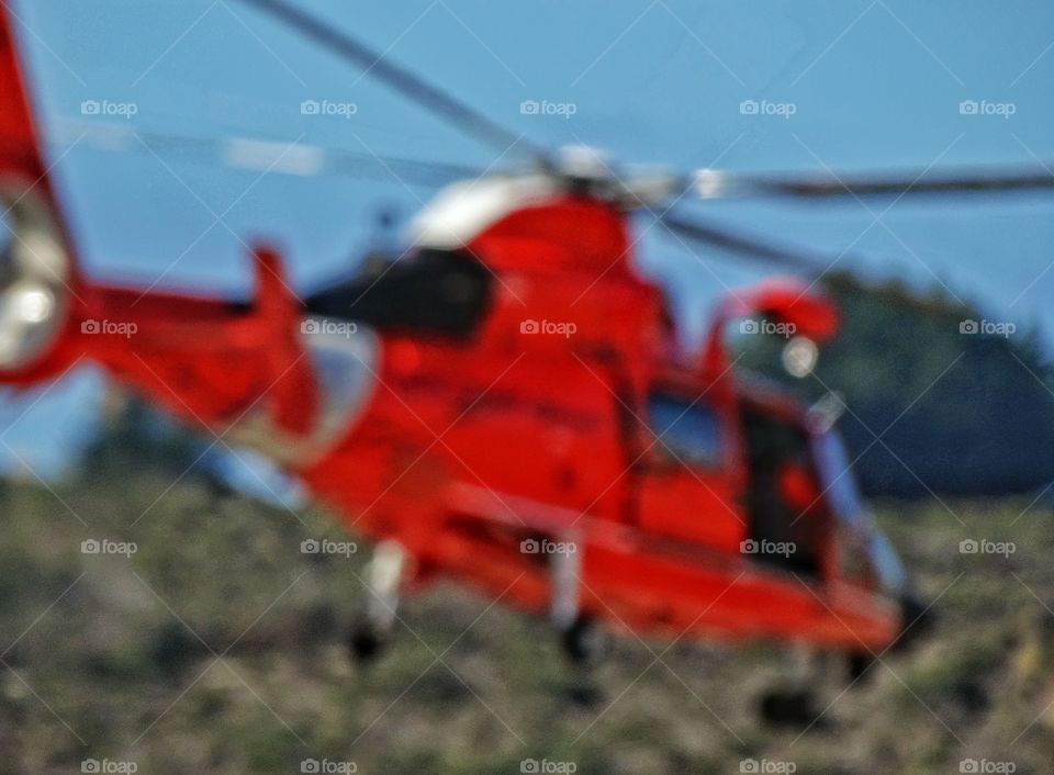 Coast Guard Helicopter Lifting Off